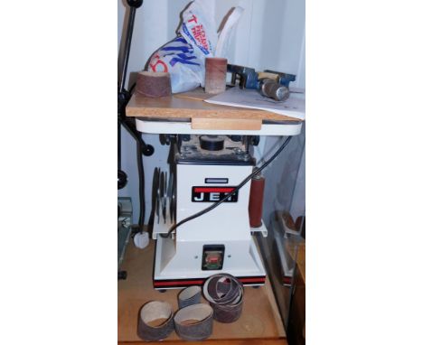 A jet oscillating spindle sander, model JBOS-5, with instruction book and a small group of sanding reels and a clamp.