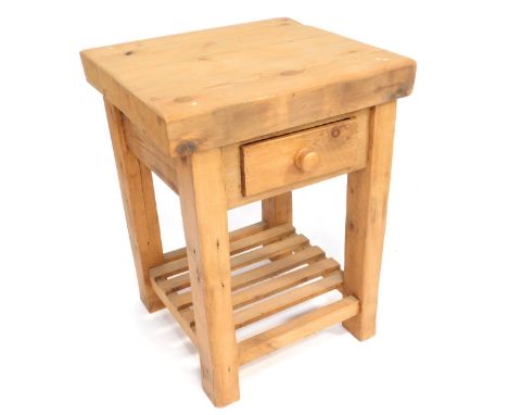 A pine butcher's block, with single drawer and shelf, 85cm high, 65cm wide, 61cm deep. 