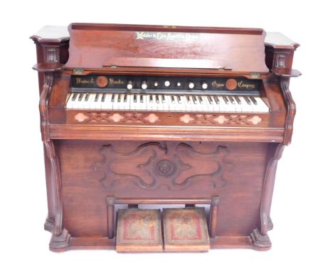 A Metzler &amp; Co American harmonium, stamped for The Mason &amp; Hamblin Organ Company, 110cm high, 116cm wide, 58cm deep.