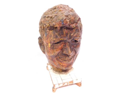 A Studio pottery bust, of a gentleman on hardwood base with applied tile detail, unmarked, possibly J F Kennedy, 40cm high.