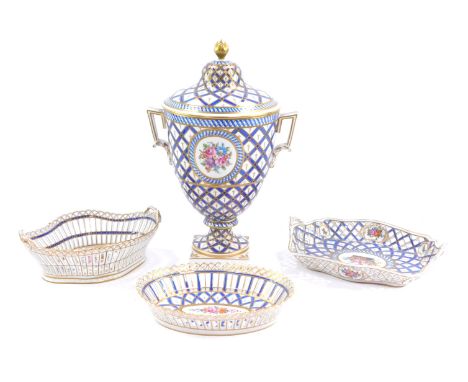 A group of Dresden China, comprising a jar and cover, with acorn finial top on a blue, gilt and white ground with painted flo