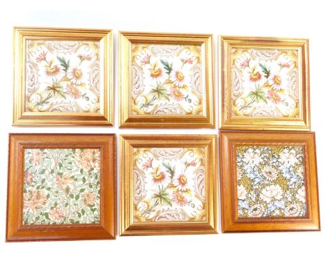 Six Victorian and later ceramic tiles, comprising a set of four floral wall tiles stamped LT England, each in gilt frame, 14.