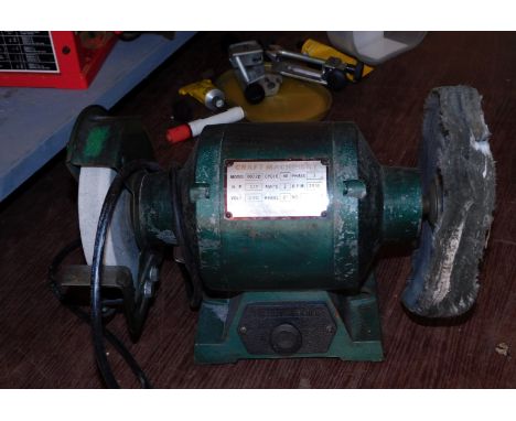 A Craft Machinery grinder/polisher, model 0003D, one phase with a 6'' wheel, 33cm diameter.WARNING! This lot contains unteste