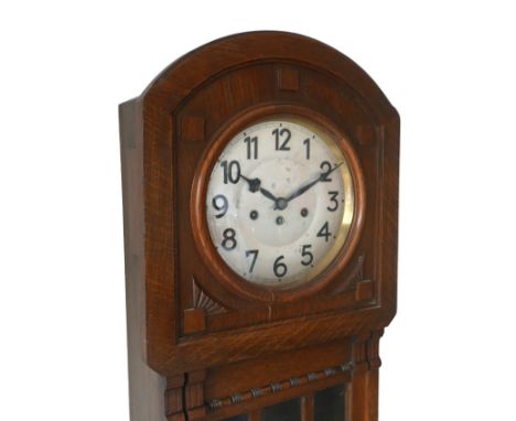 A mid 20th century Junghans oak longcase clock, silvered dial with black Arabic numerals, 8 day movement with musical chime, 