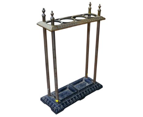 An Edwardian brass four division stick stand, black painted with rectangular base, 45 by 19.5 by 64cm high. 