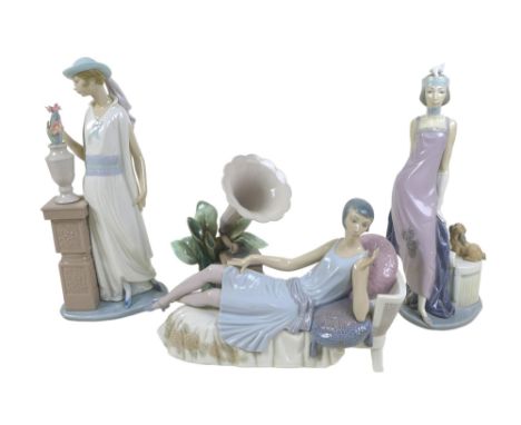Three 1920s style Lladro lady figurines, comprising 'Lady Grand Casino', #5175, 34.5cm high; 'Couplet Lady', #5174, 33.4cm hi