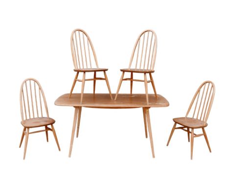 A set of four Ercol elm and beech stick back dining chairs, 'Quaker Windsor Chair', model 365, each 49 by 55 by 95cm high, to