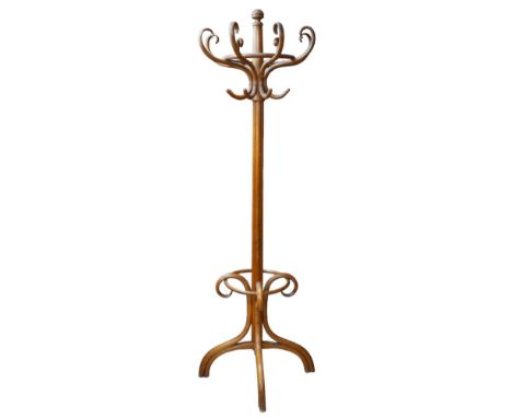 A vintage bent wood coat stand, eight branches and umbrella / stick ring, raised on four legs, 69.5 by 69.5 by 201cm high. 