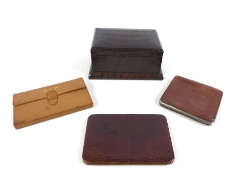 A collection of vintage leather goods, comprising an Asprey of London leather gaming wallet; two crocodile leather card cases