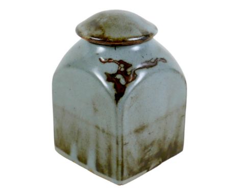 A Bernard Leach studio pottery tea caddy and cover, decorated in slate blue, grey, and brown glaze, impressed BL and studio m