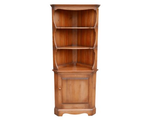 A vintage Ercol corner cupboard, 'Corner Cupboard', model 474, in polished Old Colonial colour, 54 by 54 by 184cm high.