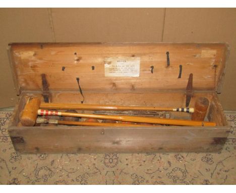 A vintage croquet set, the mallets stamps F H Ayres, London, housed within its original pine box 