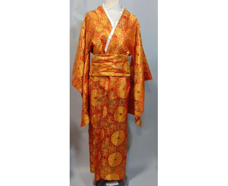 Japanese Kimono in red and gold with Obi sash and bow in good condition together with a snakeskin handbag and a gents sheepsk