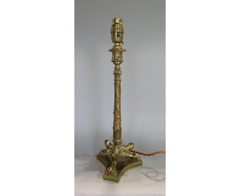 Good quality cast brass table lamp, the column with naturalistic relief decoration and three cabriole paw feet and triform pl