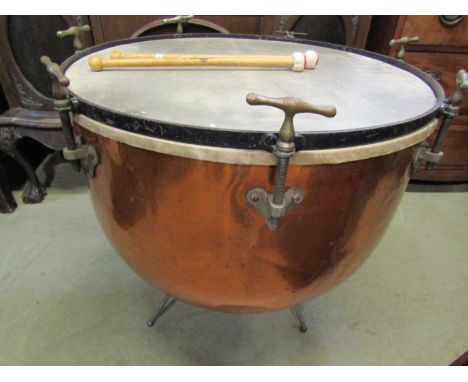 A copper kettle drum with screw fittings and adjustable tripod supports, 70 cm in diameter approx 