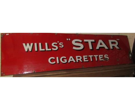 A vintage enamel sign of rectangular form advertising Wills Star cigarettes with white lettering on a red ground, 183 cm x 46