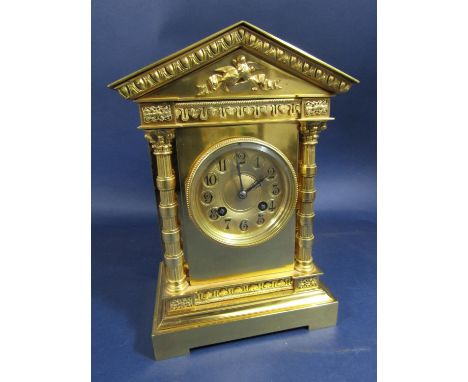 A good quality gilt brass architectural mantle clock, the gilt two train dial with Arabic numerals, striking on a gong, pendu