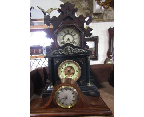 19th century black slate mantel clock of architectural form, the dial with enamel chapter ring and twin train movement, 31cm 