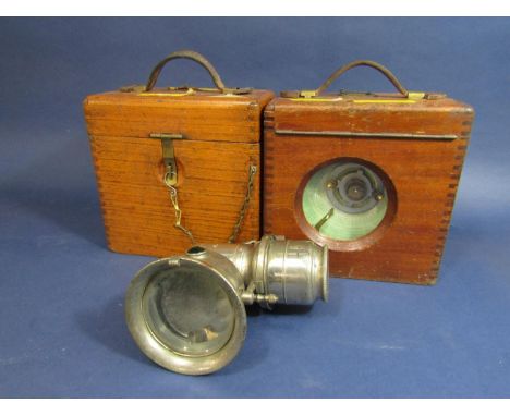 Two teak cased pigeon racing clocks, each 21cm high, together with a Joseph Lucas carriage lamp (3) 