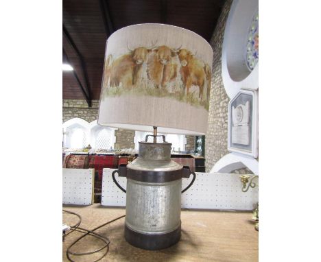 A novelty table lamp in the form of a galvanised milk churn with large shade decorated with highland cattle, 68cm high 