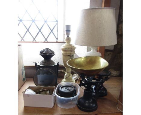 A mixed collection of items to include alabaster lamps, a carriage lantern, set of weighing scales, etc 