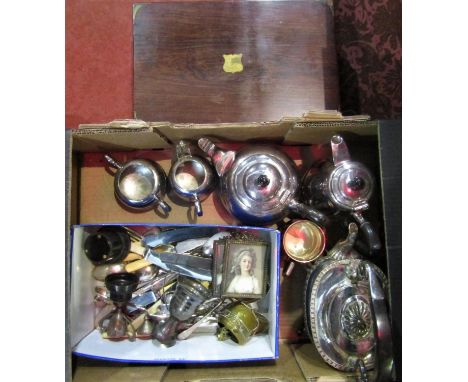 A small selection of silver plated items comprising a half fluted Georgian style spirit kettle, a four piece tea service, var