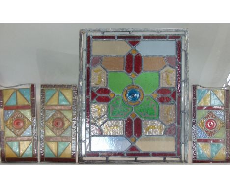 19th century leaded light panel with geometric design, 50cm x 42cm, together with three further 19th century panels, 30cm x 1