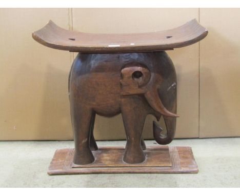 A vintage carved African Ashanti  stool in the form of a standing elephant 