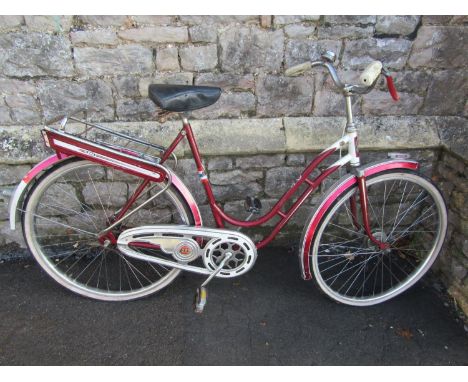 A vintage DBS ladies bicycle with sprung saddle, tubular frame, swept handlebars and aluminium fittings 