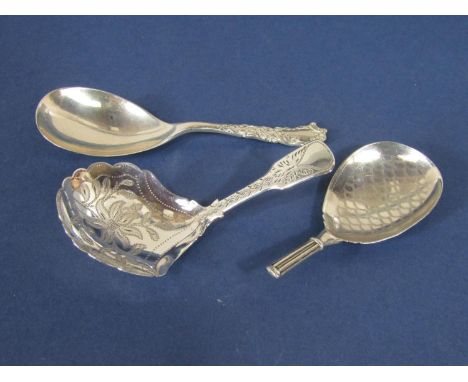 Three silver caddy spoons to include one with engraved scales to the bowl, another with fancy Albany type handle and another 