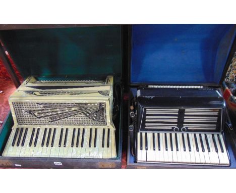 Settimio Soprani piano accordion, with mother-of-pearl effect and gem set case, boxed, together with a further boxed Astra pi