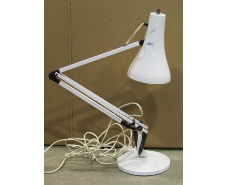 Contemporary anglepoise table lamp in a cream colourway with domed disc shaped platform base 