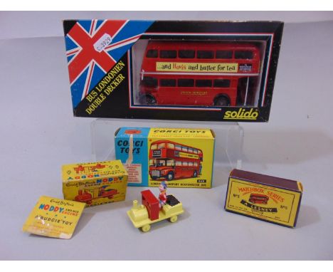 Corgi 468 Routemaster bus together with a Solido London Transport Double Decker bus, a Lesney'Matchbox' bus and a Noddy Budgi