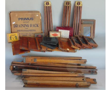 A large collection of vintage photography and photograph production equipment comprising a large collection vintage wooden tr
