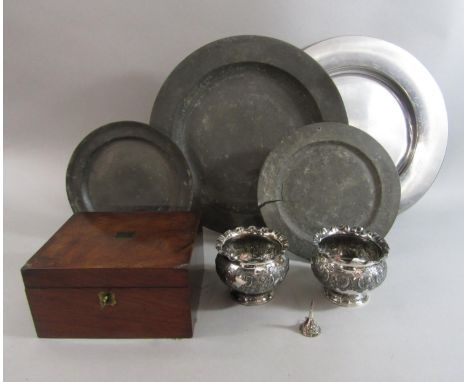 A collection of four antique pewter plates, together with a pair of ovoid silver plated dishes, small white metal funnel and 