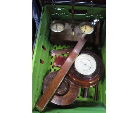 Box of interesting items comprising a circular wall barometer, brass weighing scales, spirit level, measuring tools, etc 