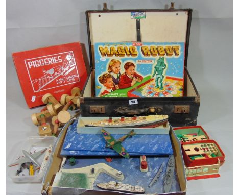 Vintage toys and games including Piggeries, Magic Robot, RMS Queen Mary 'Take to pieces' model and Dinky toy plane, ship and 