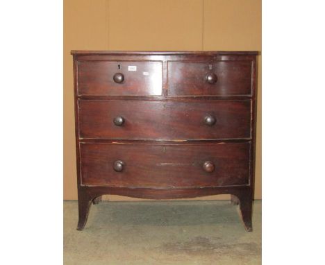 A small 19th century mahogany bow front bedroom chest of two short over two long drawers with shaped apron and splayed bracke