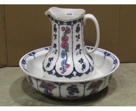 A Losol ware Dormer ceramic jug and basin with transfer printed floral detail 