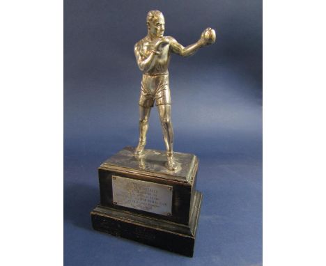 Silver plated boxing trophy, mounted by a standing boxer, with plaque inscribed 'Presented to Mr G A K Peebles, In Recognitio