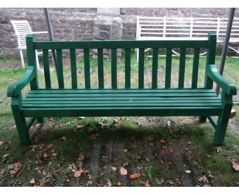 A substantial teak/possibly oak, green painted garden bench with slatted seat and back, 2 metres long 