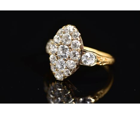 A VICTORIAN GOLD NAVETTE SHAPED DIAMOND CLUSTER RING, estimated old European cut diamond weight 1.35ct, colour assessed as G-