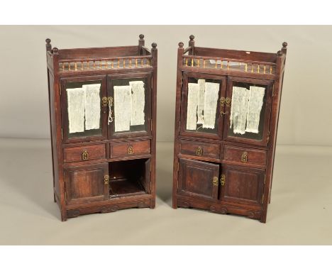 A PAIR OF EARLY 20TH CENTURY CHINESE HARDWOOD TABLE TOP CABINETS, bone gallery fronts above a pair of glazed doors, two drawe