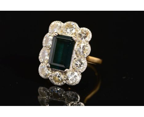A LARGE 18CT GOLD DIAMOND AND DARK GREEN TOURMALINE CLUSTER RING, emerald cut tourmaline measuring approximately 11.4mm x 7.5