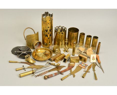 A COLLECTION OF WWI ERA TRENCH ART ITEMS, including shell cases with cut out designs around the rim, a shell with Royal Field