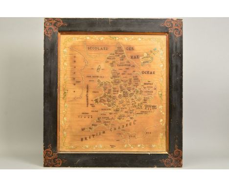 AN EARLY 19TH CENTURY NEEDLEWORK MAP SAMPLER OF THE COUNTIES OF ENGLAND AND WALES, worked in silks on a fine linen ground, by