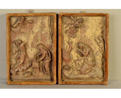 A PAIR OF 19TH CENTURY CONTINENTAL CARVED RELIGIOUS PANELS, possibly Virgin Mary receiving The Angel Gabriel and Mary Magdale