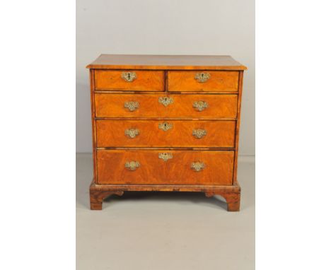 A MID 18TH CENTURY AND LATER WALNUT CHEST OF TWO SHORT OVER THREE LONG DRAWERS, feather banded inlay to the rectangular top, 