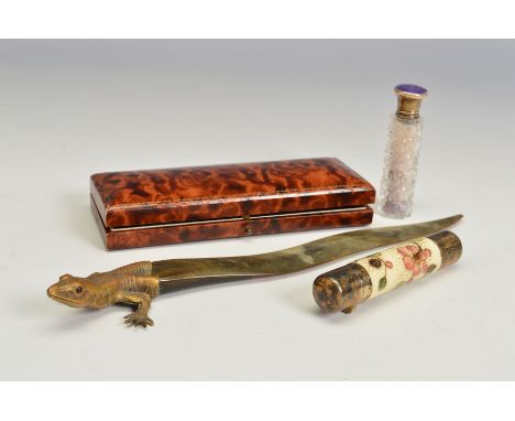 A VICTORIAN SILVER GILT AND CERAMIC CYLINDRICAL DOUBLE ENDED SCENT BOTTLE, the ivory ground painted with flowers, screw cap e