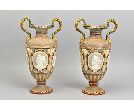 A PAIR OF LATE 19TH CENTURY VILLEROY &amp; BOCH METTLACH TWIN HANDLED BALUSTER VASES, glazed rims and handles, of which the h